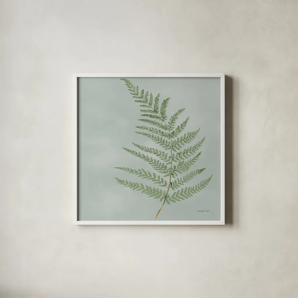 Fern II by Danhui Nai. Shown in a crisp white glass frame for a clean and minimalist style. Available as an archival giclee rolled canvas, fine art paper, or poster print. SKU 84103a.