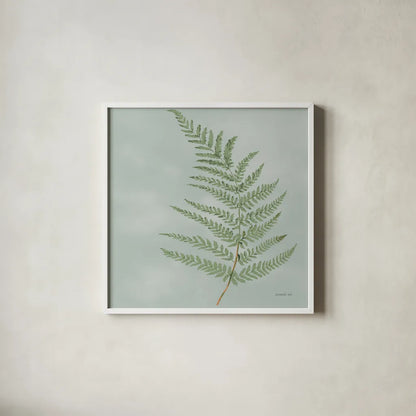 Fern II with Orange by Danhui Nai. Shown in a crisp white glass frame for a clean and minimalist style. Available as an archival giclee rolled canvas, fine art paper, or poster print. SKU 86269a.