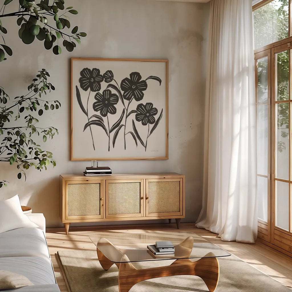 Floral Simplicity I Cream by Danhui Nai. Shown in a natural wood frame in a cozy modern living room. Available as an archival giclee rolled canvas, fine art paper, or poster print. SKU 81929a.