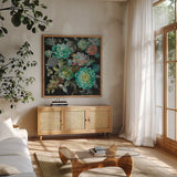 Floral Succulents by Danhui Nai. Shown in a natural wood frame in a cozy modern living room. Available as an archival giclee rolled canvas, fine art paper, or poster print. SKU 32083a.