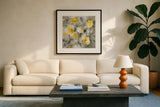 Floral Uplift Yellow Gray by Danhui Nai. Displayed in a glass frame with matte in a clean modern living room. Available as an archival giclee rolled canvas, fine art paper, or poster print. SKU 68683a.