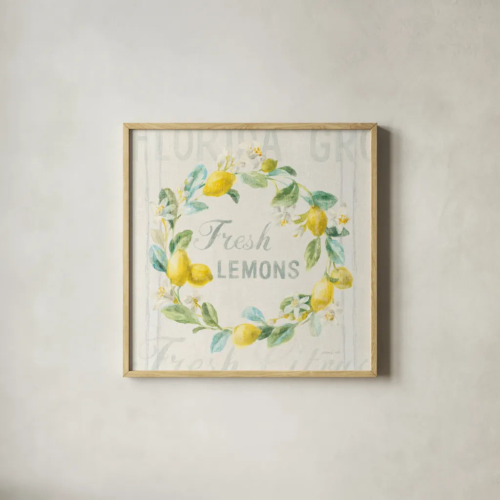 Floursack Lemon V by Danhui Nai. Shown in a natural wood glass frame for a timeless modern aesthetic. Available as an archival giclee rolled canvas, fine art paper, or poster print. SKU 45786a.