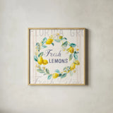 Floursack Lemon V Bright by Danhui Nai. Shown in a natural wood glass frame for a timeless modern aesthetic. Available as an archival giclee rolled canvas, fine art paper, or poster print. SKU 46701a.