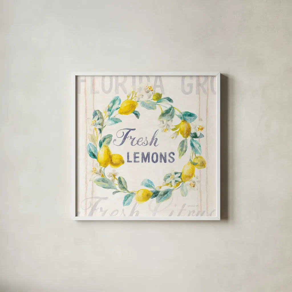 Floursack Lemon V Bright by Danhui Nai. Shown in a crisp white glass frame for a clean and minimalist style. Available as an archival giclee rolled canvas, fine art paper, or poster print. SKU 46701a.