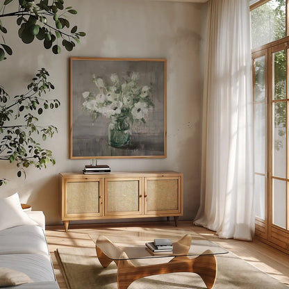 Fresh Anemones Sage Border by Danhui Nai. Shown in a natural wood frame in a cozy modern living room. Available as an archival giclee rolled canvas, fine art paper, or poster print. SKU 84300a.