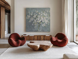 Fresh White Bouquet Gray Crop by Danhui Nai. Shown as extra-large giant wall art in a modern living room. Available as an archival giclee rolled canvas, fine art paper, or poster print. SKU 75578a.