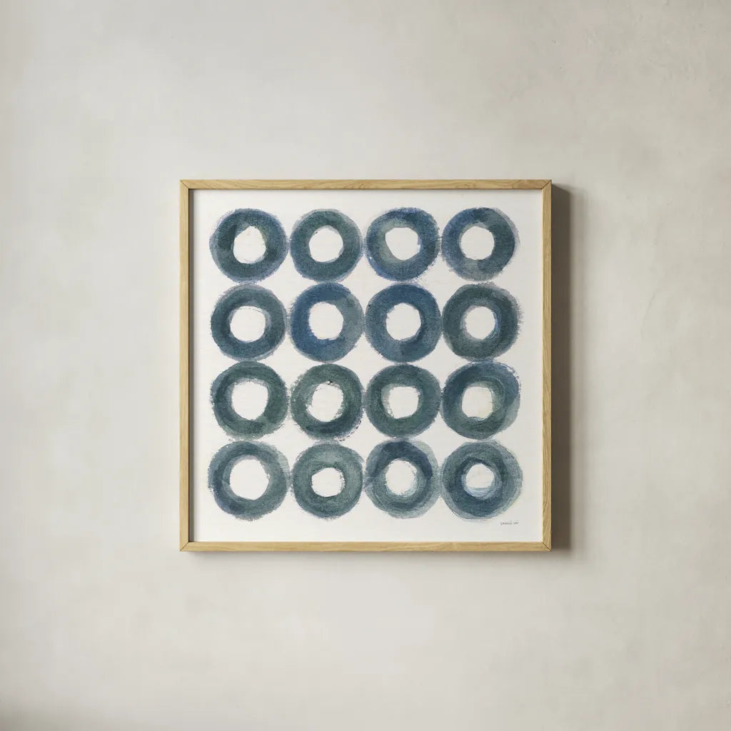 Fullness of Circles by Danhui Nai. Shown in a natural wood glass frame for a timeless modern aesthetic. Available as an archival giclee rolled canvas, fine art paper, or poster print. SKU 70424a.