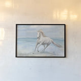 Gallop on the Beach by Danhui Nai. shown as a paper print in a black flame. Available as a archival giclee rolled canvas, fine art paper, or poster print. SKU 82190i.