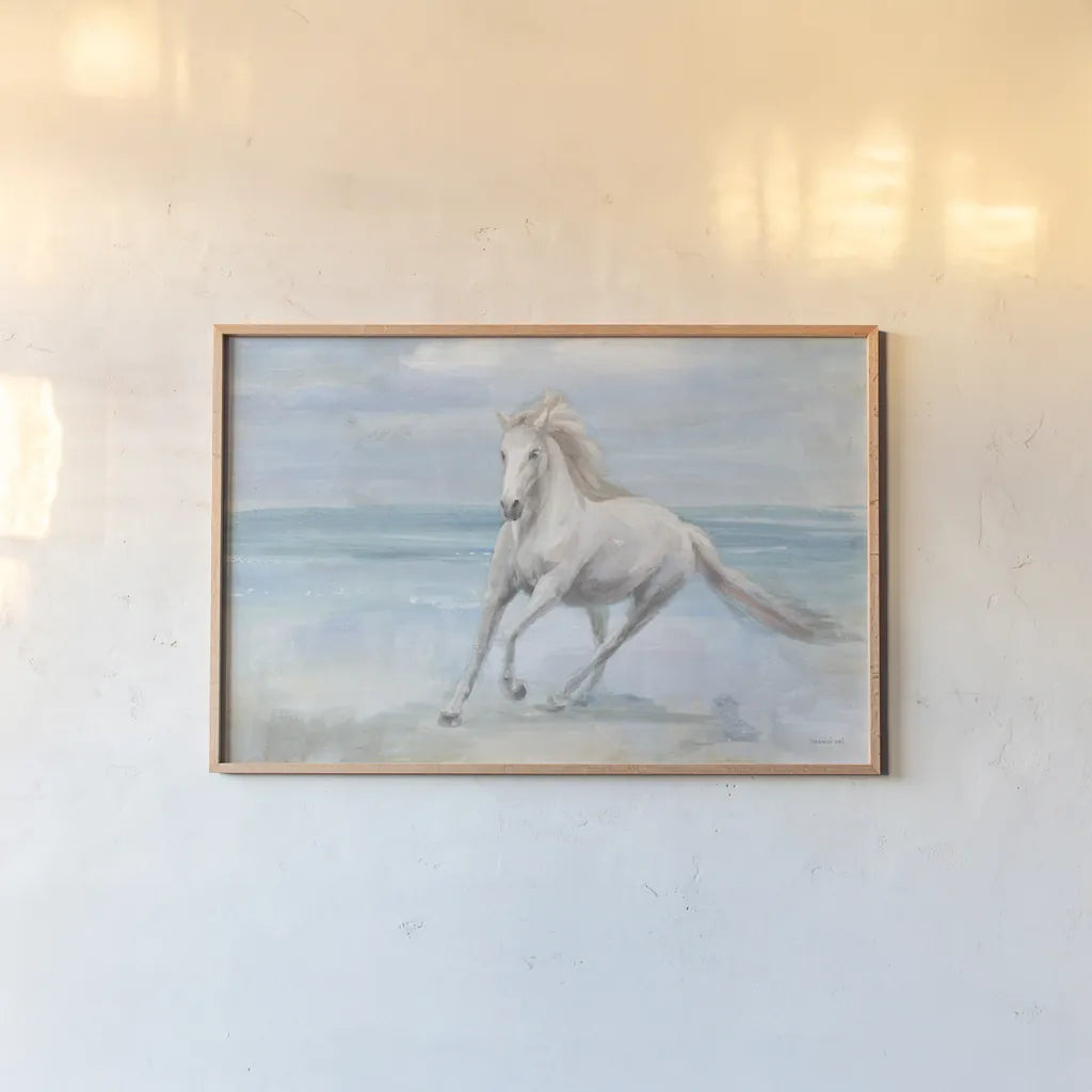 Gallop on the Beach by Danhui Nai. shown as a paper print in a natural frame. Available as a archival giclee rolled canvas, fine art paper, or poster print. SKU 82190i.