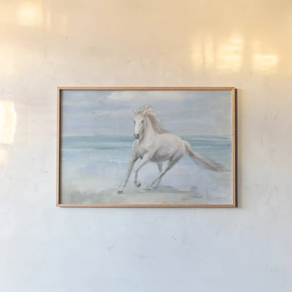 Gallop on the Beach by Danhui Nai. shown as a paper print in a natural frame. Available as a archival giclee rolled canvas, fine art paper, or poster print. SKU 82190i.