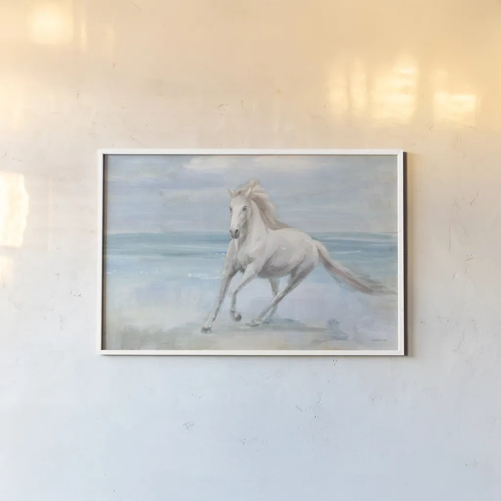 Gallop on the Beach by Danhui Nai. shown as a paper print in a white frame. Available as a archival giclee rolled canvas, fine art paper, or poster print. SKU 82190i.