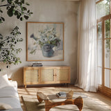 Garden Blooms II Blue Crop by Danhui Nai. Shown in a natural wood frame in a cozy modern living room. Available as an archival giclee rolled canvas, fine art paper, or poster print. SKU 44812a.