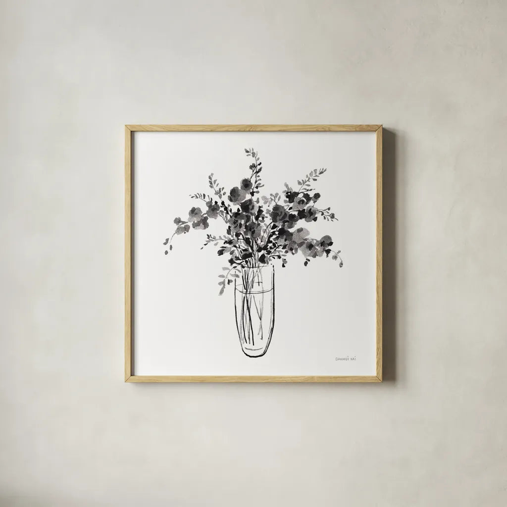 Garden Cuttings I Black by Danhui Nai. Shown in a natural wood glass frame for a timeless modern aesthetic. Available as an archival giclee rolled canvas, fine art paper, or poster print. SKU 77414a.