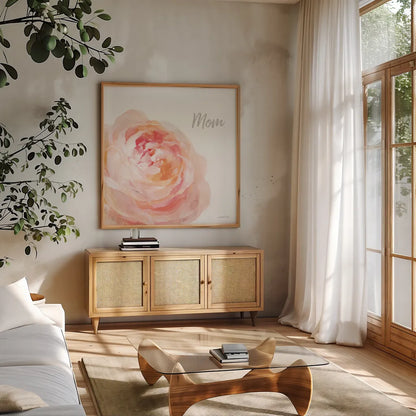 Garden Rose on White Crop II Mom by Danhui Nai. Shown in a natural wood frame in a cozy modern living room. Available as an archival giclee rolled canvas, fine art paper, or poster print. SKU 41682a.