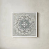 Gentle Mandala by Danhui Nai. Shown in a crisp white glass frame for a clean and minimalist style. Available as an archival giclee rolled canvas, fine art paper, or poster print. SKU 86228a.
