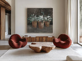 Geranium Glory II by Danhui Nai. Shown as extra-large giant wall art in a modern living room. Available as an archival giclee rolled canvas, fine art paper, or poster print. SKU 84145a.