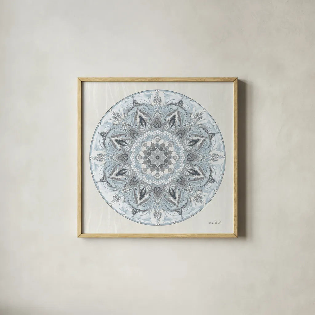 Goa Mandala I Dusty Blue by Danhui Nai. Shown in a natural wood glass frame for a timeless modern aesthetic. Available as an archival giclee rolled canvas, fine art paper, or poster print. SKU 89988a.
