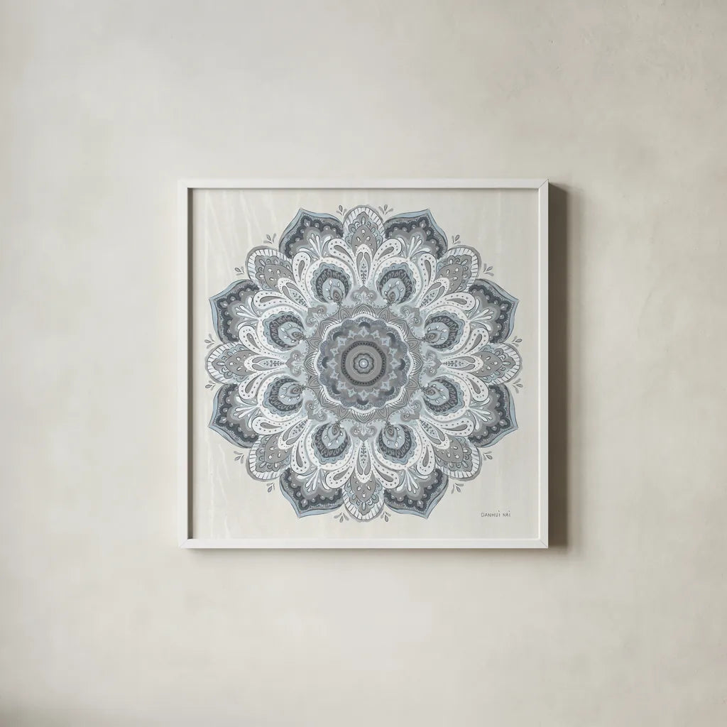 Goa Mandala II Dusty Blue by Danhui Nai. Shown in a crisp white glass frame for a clean and minimalist style. Available as an archival giclee rolled canvas, fine art paper, or poster print. SKU 89989a.