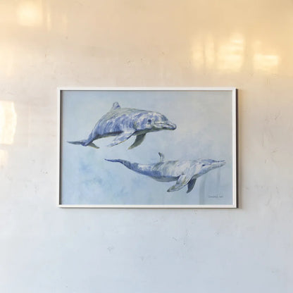 Graceful Dolphins I by Danhui Nai. shown as a paper print in a white frame. Available as a archival giclee rolled canvas, fine art paper, or poster print. SKU 93408i.