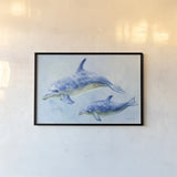 Graceful Dolphins II by Danhui Nai. shown as a paper print in a black flame. Available as a archival giclee rolled canvas, fine art paper, or poster print. SKU 93409i.