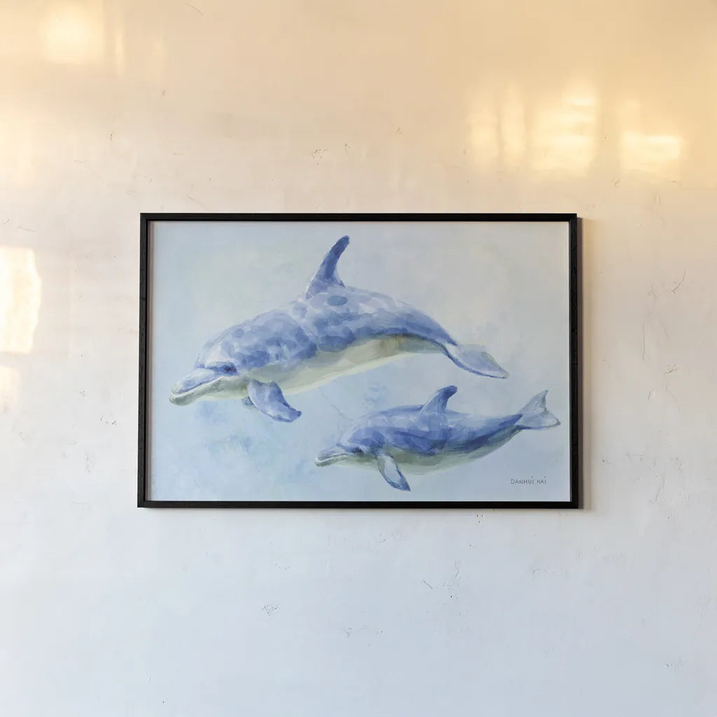Graceful Dolphins II by Danhui Nai. shown as a paper print in a black flame. Available as a archival giclee rolled canvas, fine art paper, or poster print. SKU 93409i.