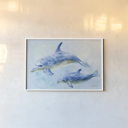 Graceful Dolphins II by Danhui Nai. shown as a paper print in a white frame. Available as a archival giclee rolled canvas, fine art paper, or poster print. SKU 93409i.