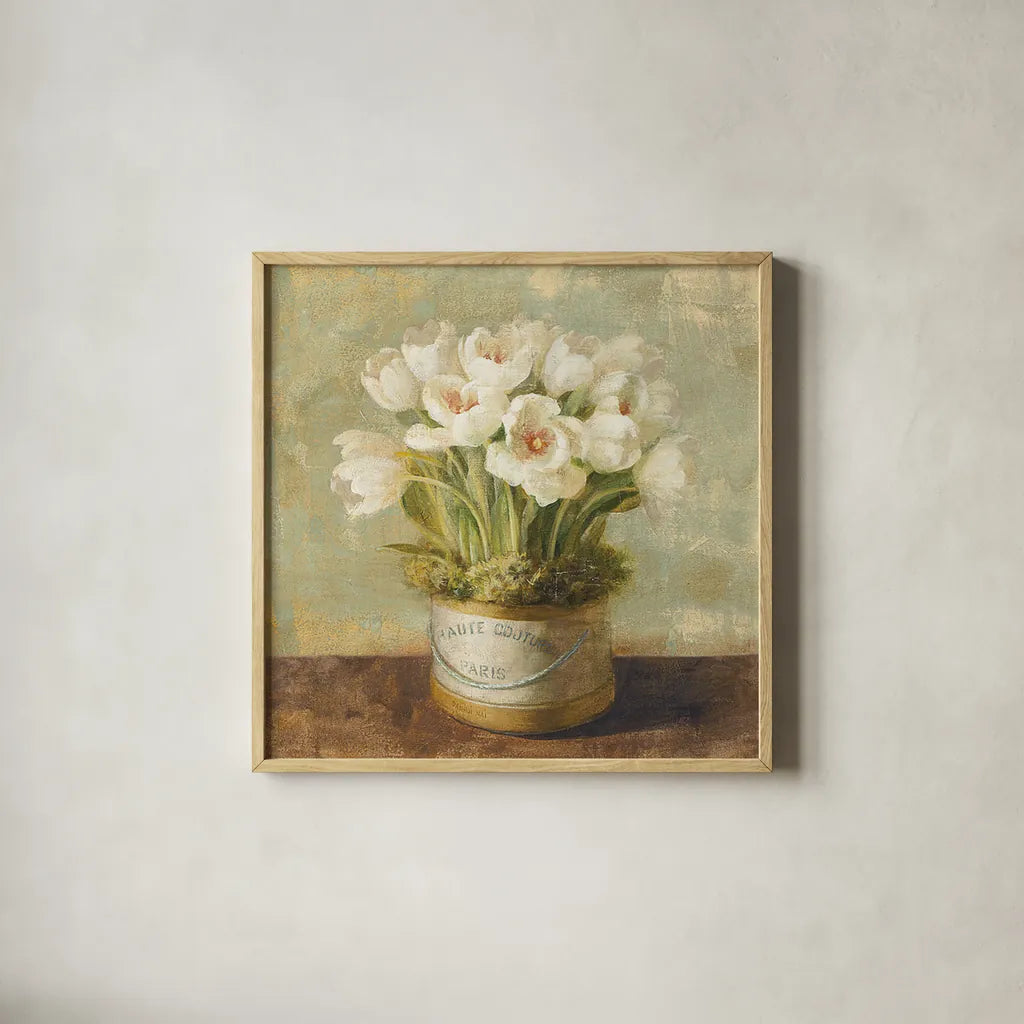 Hatbox Tulips by Danhui Nai. Shown in a natural wood glass frame for a timeless modern aesthetic. Available as an archival giclee rolled canvas, fine art paper, or poster print. SKU 9336a.