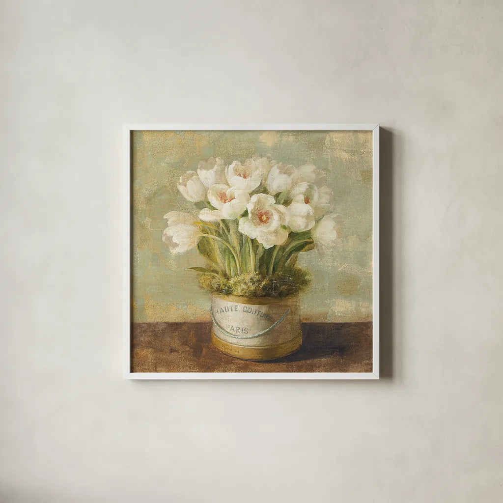 Hatbox Tulips by Danhui Nai. Shown in a crisp white glass frame for a clean and minimalist style. Available as an archival giclee rolled canvas, fine art paper, or poster print. SKU 9336a.