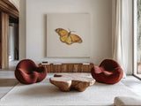 Honeybloom Butterfly III by Danhui Nai. Shown as extra-large giant wall art in a modern living room. Available as an archival giclee rolled canvas, fine art paper, or poster print. SKU 95261a.