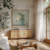 June Roses II White Blue Crop by Danhui Nai. Shown in a natural wood frame in a cozy modern living room. Available as an archival giclee rolled canvas, fine art paper, or poster print. SKU 44778a.