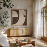 Laid Back Chocolate Brown by Danhui Nai. Shown in a natural wood frame in a cozy modern living room. Available as an archival giclee rolled canvas, fine art paper, or poster print. SKU 91418a.