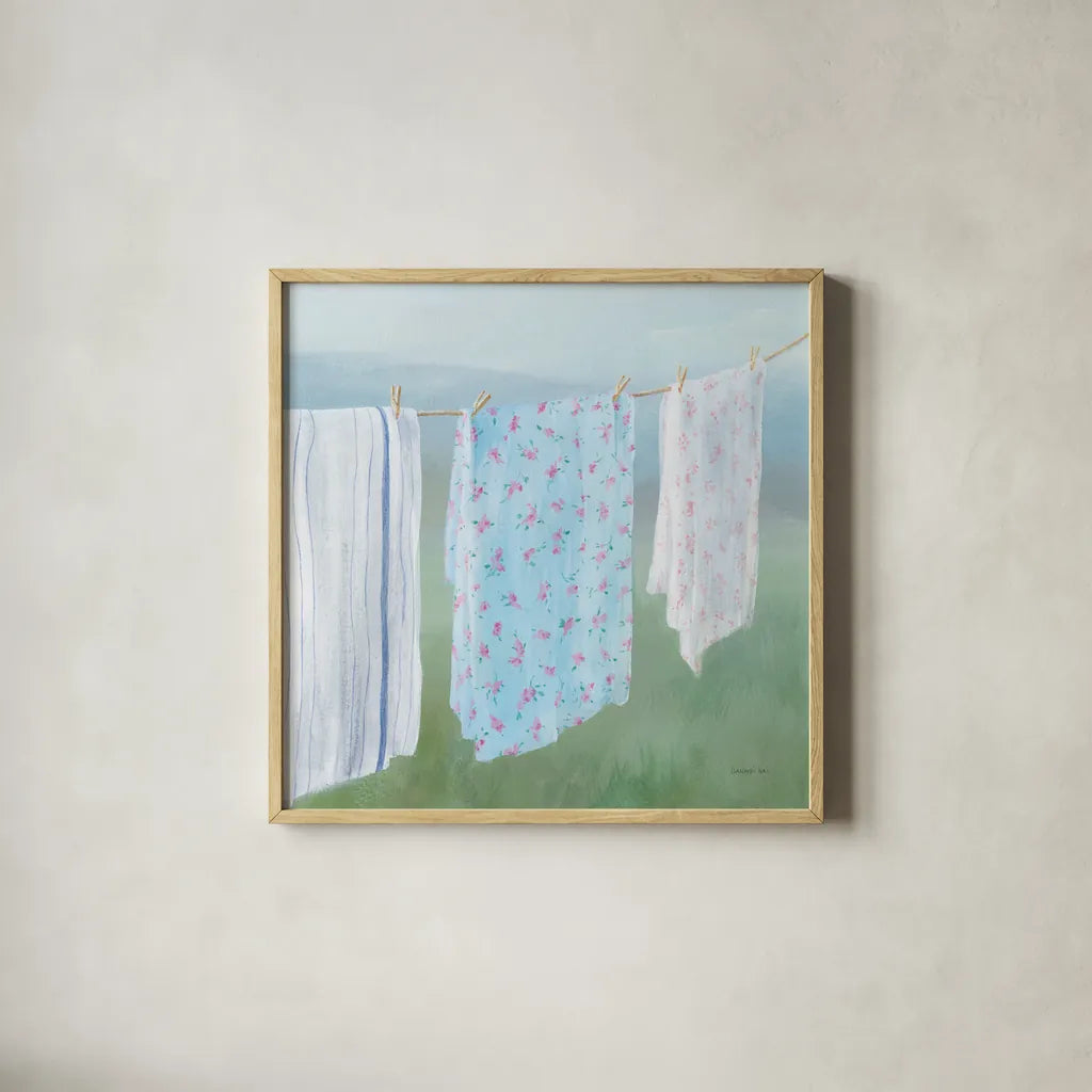 Laundry Day II by Danhui Nai. Shown in a natural wood glass frame for a timeless modern aesthetic. Available as an archival giclee rolled canvas, fine art paper, or poster print. SKU 73584a.