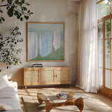 Laundry Day II by Danhui Nai. Shown in a natural wood frame in a cozy modern living room. Available as an archival giclee rolled canvas, fine art paper, or poster print. SKU 73584a.