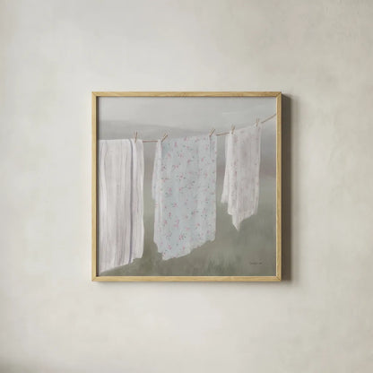 Laundry Day II Neutral by Danhui Nai. Shown in a natural wood glass frame for a timeless modern aesthetic. Available as an archival giclee rolled canvas, fine art paper, or poster print. SKU 86425a.