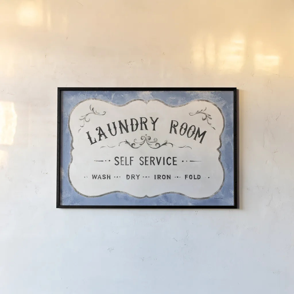 Laundry Day VII Bright Blue by Danhui Nai. shown as a paper print in a black flame. Available as a archival giclee rolled canvas, fine art paper, or poster print. SKU 75987i.