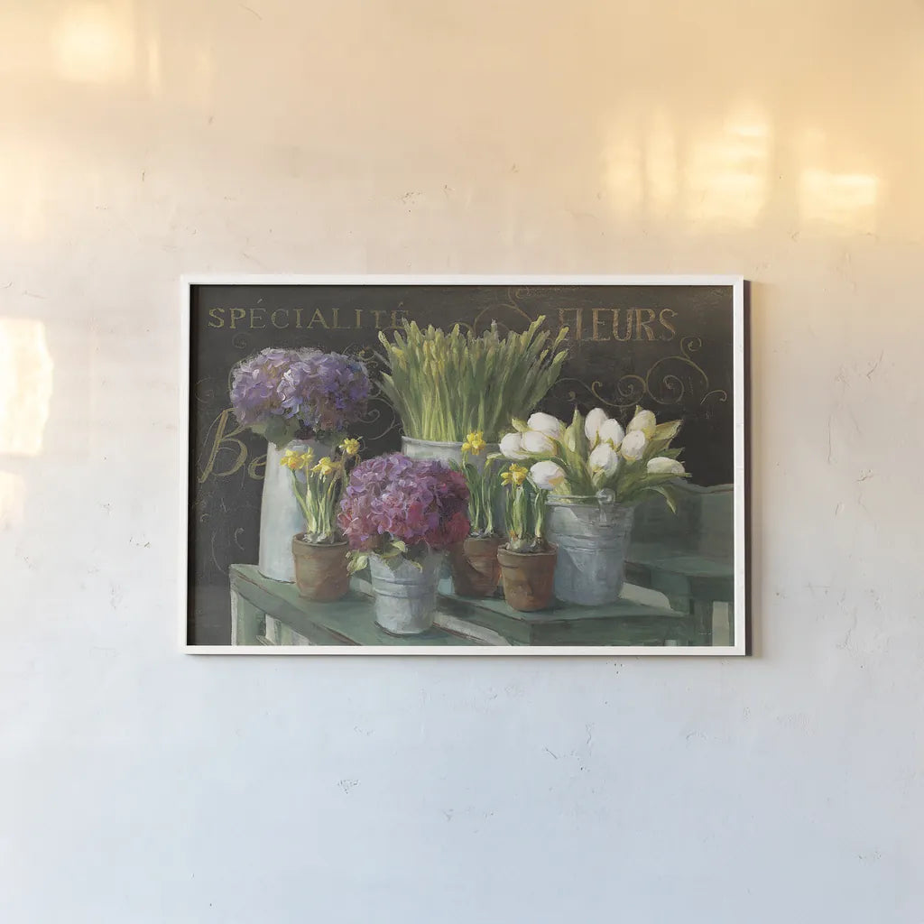Les Fleurs Printemps on Black by Danhui Nai. shown as a paper print in a white frame. Available as a archival giclee rolled canvas, fine art paper, or poster print. SKU 24674i.
