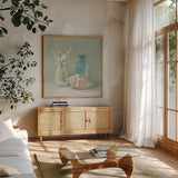 Lily of the Valley Spa by Danhui Nai. Shown in a natural wood frame in a cozy modern living room. Available as an archival giclee rolled canvas, fine art paper, or poster print. SKU 5598a.