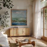 Lush Valley by Danhui Nai. Shown in a natural wood frame in a cozy modern living room. Available as an archival giclee rolled canvas, fine art paper, or poster print. SKU 89865a.