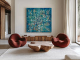 Mandala in Blue I Sq by Danhui Nai. Shown as extra-large giant wall art in a modern living room. Available as an archival giclee rolled canvas, fine art paper, or poster print. SKU 23482a.