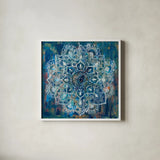 Mandala in Blue II by Danhui Nai. Shown in a crisp white glass frame for a clean and minimalist style. Available as an archival giclee rolled canvas, fine art paper, or poster print. SKU 23483a.