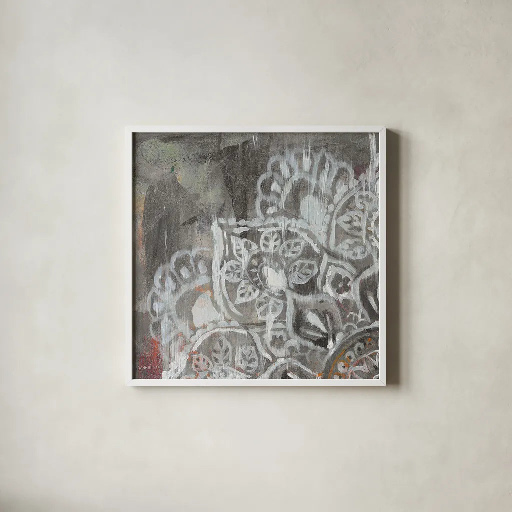 Mandala in Neutral II Sq I by Danhui Nai. Shown in a crisp white glass frame for a clean and minimalist style. Available as an archival giclee rolled canvas, fine art paper, or poster print. SKU 28147a.