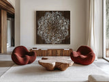 Mandala on Dark Wood by Danhui Nai. Shown as extra-large giant wall art in a modern living room. Available as an archival giclee rolled canvas, fine art paper, or poster print. SKU 51727a.