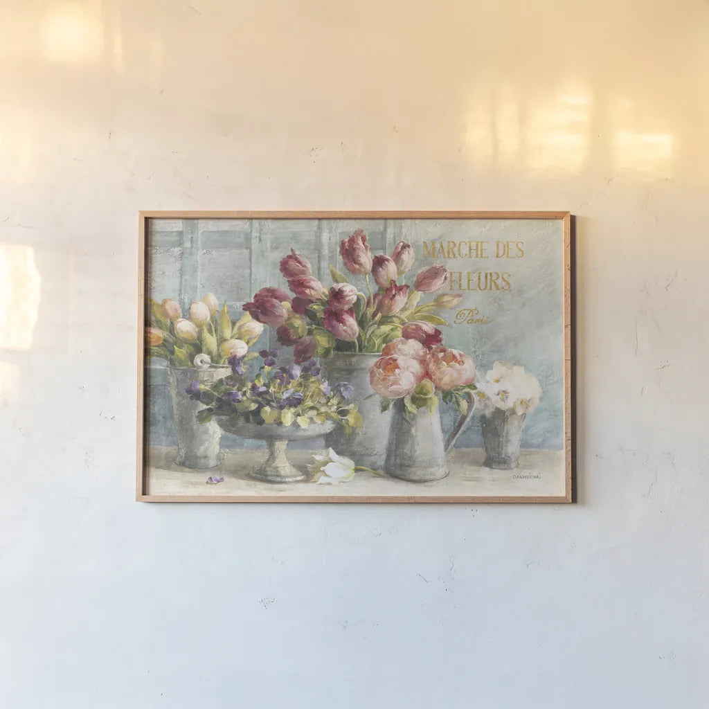 Marche des Fleurs Blue Gold by Danhui Nai. shown as a paper print in a natural frame. Available as a archival giclee rolled canvas, fine art paper, or poster print. SKU 19047i.