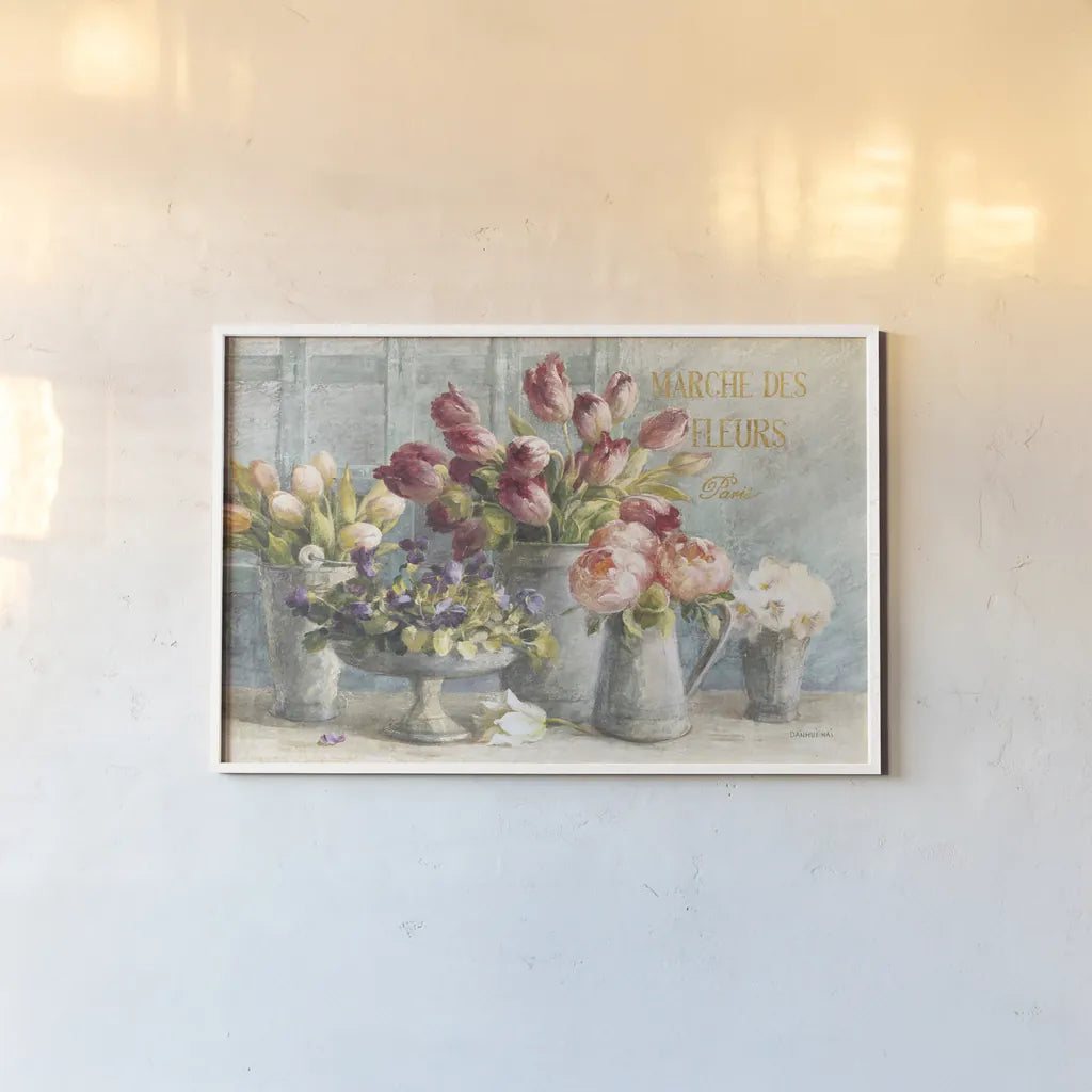 Marche des Fleurs Blue Gold by Danhui Nai. shown as a paper print in a white frame. Available as a archival giclee rolled canvas, fine art paper, or poster print. SKU 19047i.