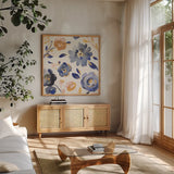 May Flowers III by Danhui Nai. Shown in a natural wood frame in a cozy modern living room. Available as an archival giclee rolled canvas, fine art paper, or poster print. SKU 71821a.