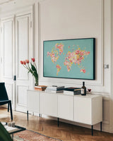 Midsummer World Turquoise by Danhui Nai. shown as a framed stretched canvas in a living room above a console. Available as a archival giclee rolled canvas, fine art paper, or poster print. SKU 49368i.