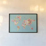 Midsummer World Turquoise by Danhui Nai. shown as a paper print in a black flame. Available as a archival giclee rolled canvas, fine art paper, or poster print. SKU 49368i.