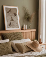 Migration Brown Panel I by Danhui Nai. shown as a paper print in a natural frame. Available as a archival giclee rolled canvas, fine art paper, or poster print. SKU 94455h.