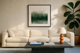 Misty Forest Evergreen by Danhui Nai. Displayed in a glass frame with matte in a clean modern living room. Available as an archival giclee rolled canvas, fine art paper, or poster print. SKU 96649a.