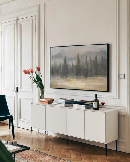 Misty Pines by Danhui Nai. shown as a framed stretched canvas in a living room above a console. Available as a archival giclee rolled canvas, fine art paper, or poster print. SKU 70122i.